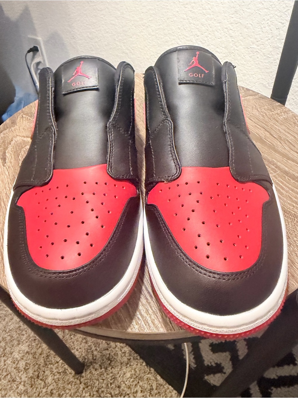 Nike Air Jordan 1 Mule Golf "Bred" slip-on shoes.